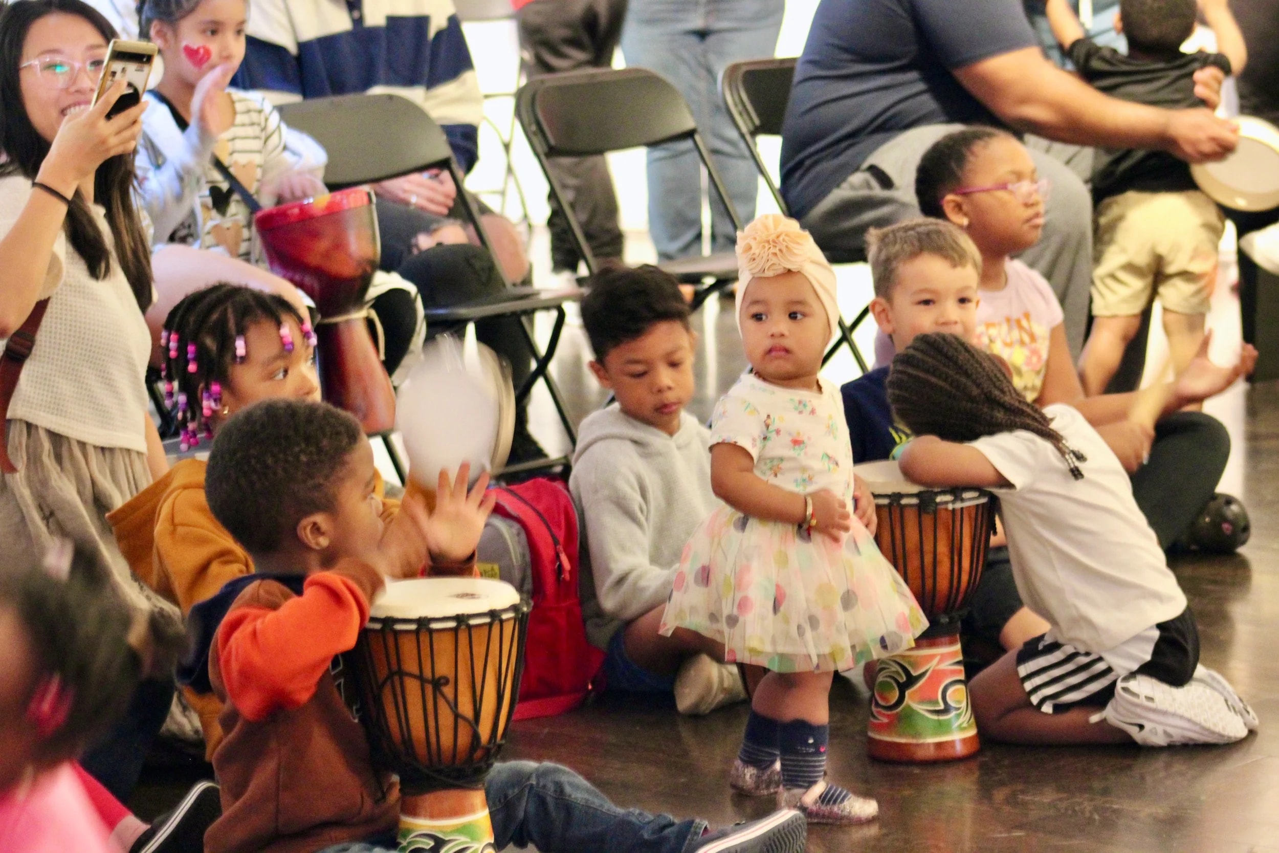 Children with drums at Barbara Bush Library program