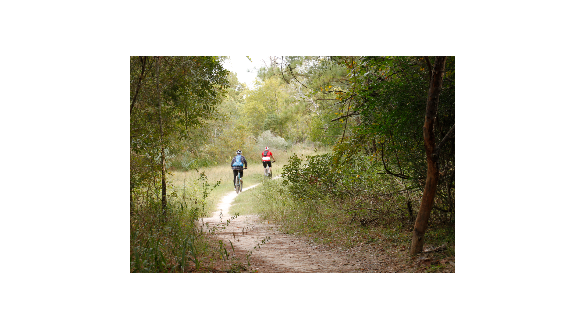 Cyclists on Cypress Creek Greenway trail